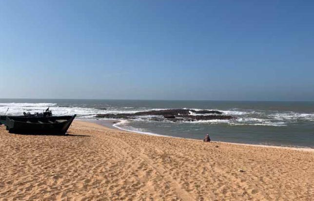 A dramatic landscape featuring glaciers and a snowy mountain, highlighting the contrast between cold and warm seas.